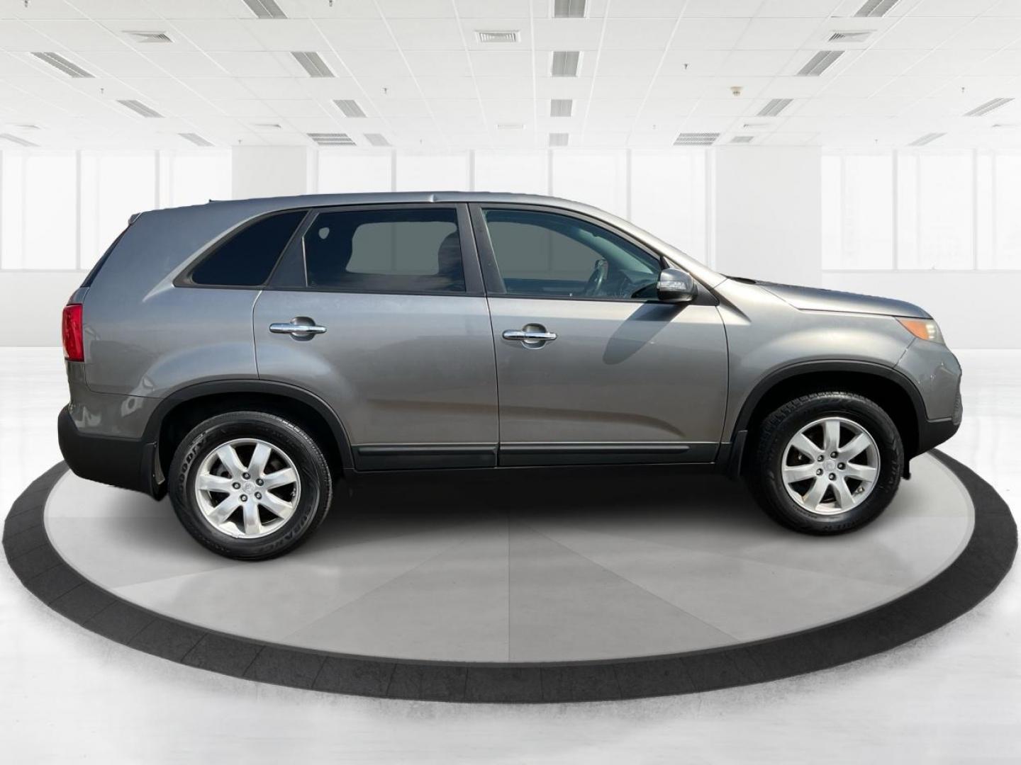 2012 Kia Sorento LX (5XYKT3A17CG) with an 2.4L I-4 DOHC engine, located at 401 Woodman Dr, Riverside, OH, 45431, (937) 908-9800, 39.760899, -84.123421 - 2012 Kia Sorento LX - Photo#1