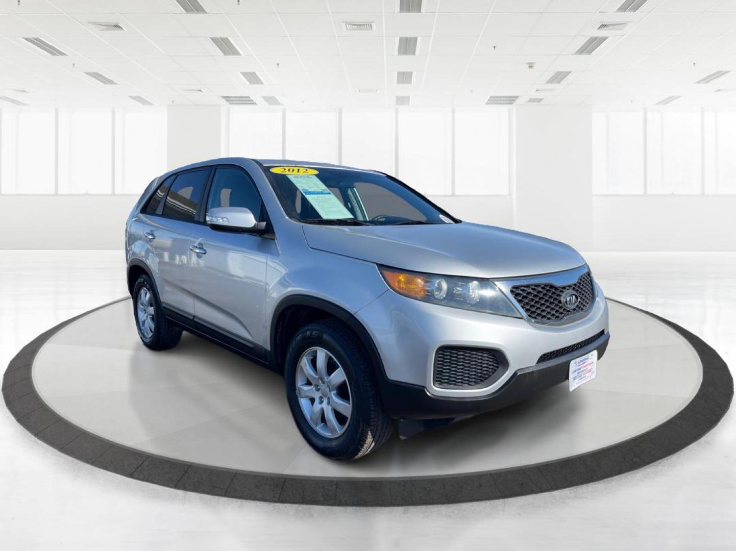 2012 Kia Sorento LX 2WD (5XYKT3A1XCG) with an 2.4L L4 DOHC 16V engine, 6-Speed Automatic transmission, located at 1099 N County Rd 25A , Troy, OH, 45373, (937) 908-9800, 40.057079, -84.212883 - One Owner - Photo#0