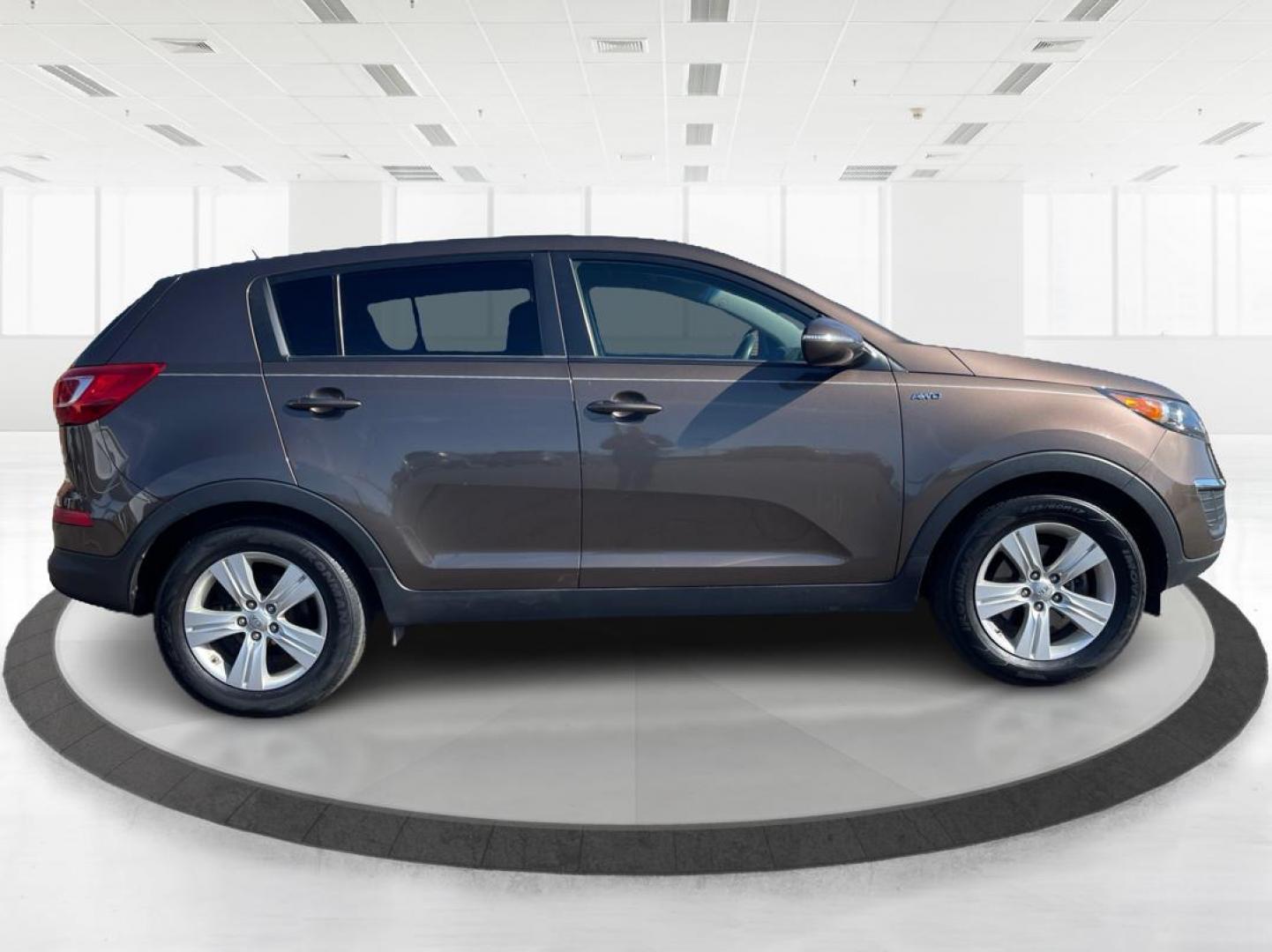 2012 Kia Sportage LX (KNDPBCA20C7) with an 2.4L I-4 DOHC engine, located at 401 Woodman Dr, Riverside, OH, 45431, (937) 908-9800, 39.760899, -84.123421 - 2012 Kia Sportage LX - Photo#1