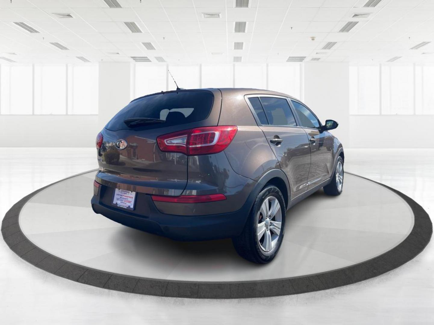 2012 Kia Sportage LX (KNDPBCA20C7) with an 2.4L I-4 DOHC engine, located at 401 Woodman Dr, Riverside, OH, 45431, (937) 908-9800, 39.760899, -84.123421 - 2012 Kia Sportage LX - Photo#2