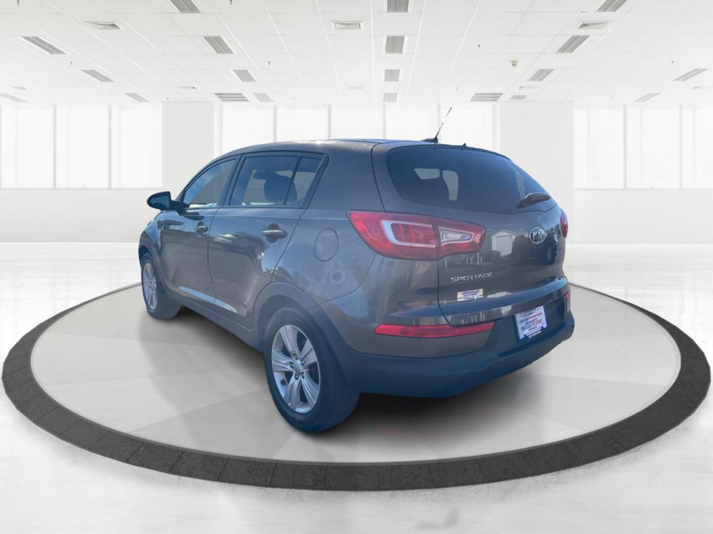 2012 Kia Sportage LX (KNDPBCA20C7) with an 2.4L I-4 DOHC engine, located at 401 Woodman Dr, Riverside, OH, 45431, (937) 908-9800, 39.760899, -84.123421 - 2012 Kia Sportage LX - Photo#4