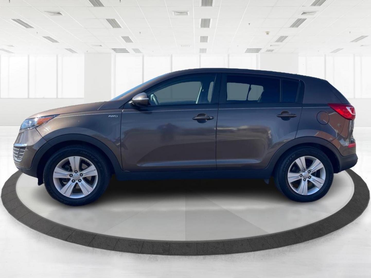 2012 Kia Sportage LX (KNDPBCA20C7) with an 2.4L I-4 DOHC engine, located at 401 Woodman Dr, Riverside, OH, 45431, (937) 908-9800, 39.760899, -84.123421 - 2012 Kia Sportage LX - Photo#5