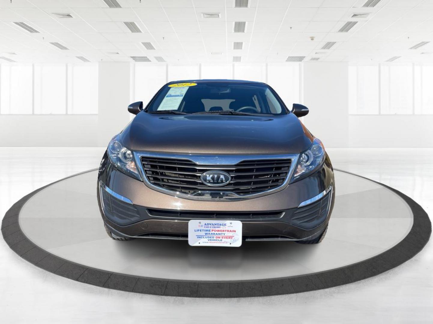 2012 Kia Sportage LX (KNDPBCA20C7) with an 2.4L I-4 DOHC engine, located at 401 Woodman Dr, Riverside, OH, 45431, (937) 908-9800, 39.760899, -84.123421 - 2012 Kia Sportage LX - Photo#6