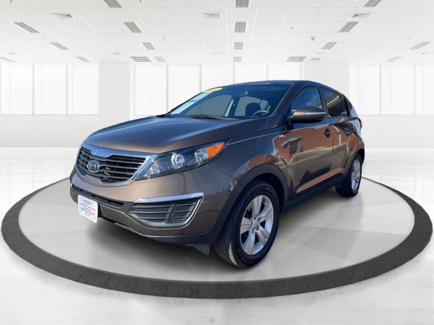2012 Kia Sportage LX (KNDPBCA20C7) with an 2.4L I-4 DOHC engine, located at 401 Woodman Dr, Riverside, OH, 45431, (937) 908-9800, 39.760899, -84.123421 - 2012 Kia Sportage LX - Photo#7