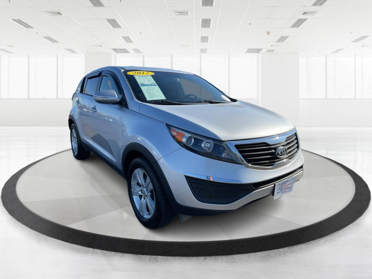 2012 Kia Sportage LX (KNDPB3A21C7) with an 2.4L I-4 DOHC engine, located at 401 Woodman Dr, Riverside, OH, 45431, (937) 908-9800, 39.760899, -84.123421 - One Owner - Photo#0