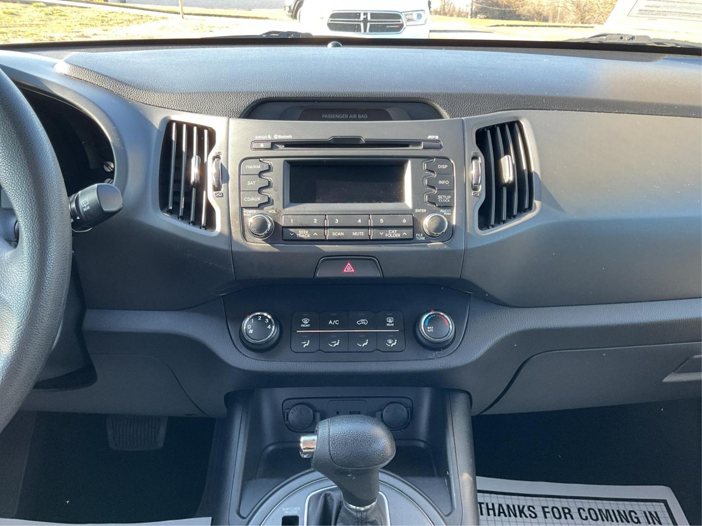2012 Kia Sportage LX (KNDPB3A21C7) with an 2.4L I-4 DOHC engine, located at 401 Woodman Dr, Riverside, OH, 45431, (937) 908-9800, 39.760899, -84.123421 - One Owner - Photo#12
