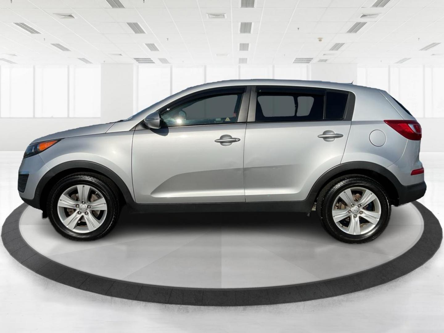 2012 Kia Sportage LX (KNDPB3A21C7) with an 2.4L I-4 DOHC engine, located at 401 Woodman Dr, Riverside, OH, 45431, (937) 908-9800, 39.760899, -84.123421 - One Owner - Photo#5