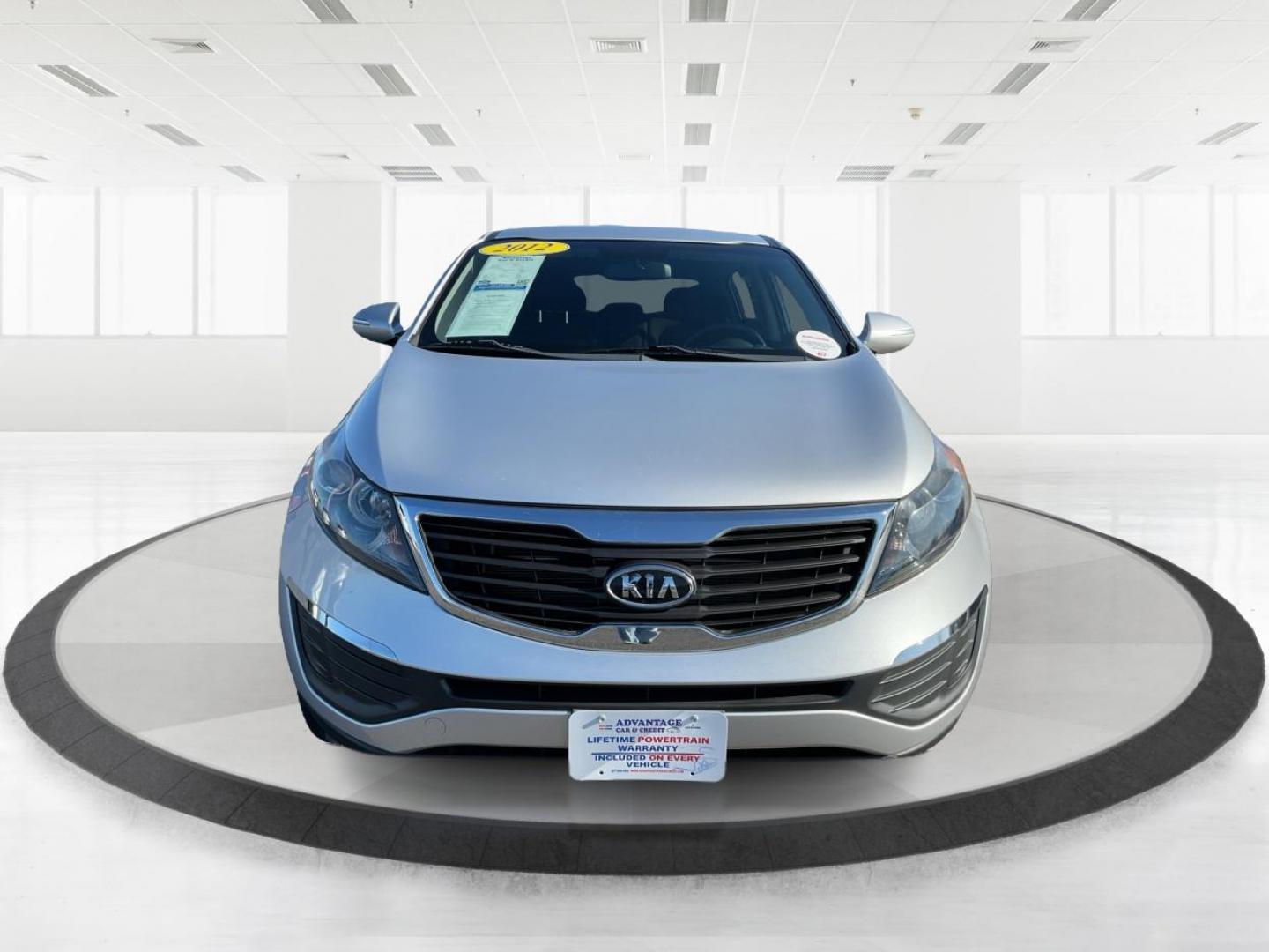 2012 Kia Sportage LX (KNDPB3A21C7) with an 2.4L I-4 DOHC engine, located at 401 Woodman Dr, Riverside, OH, 45431, (937) 908-9800, 39.760899, -84.123421 - One Owner - Photo#6