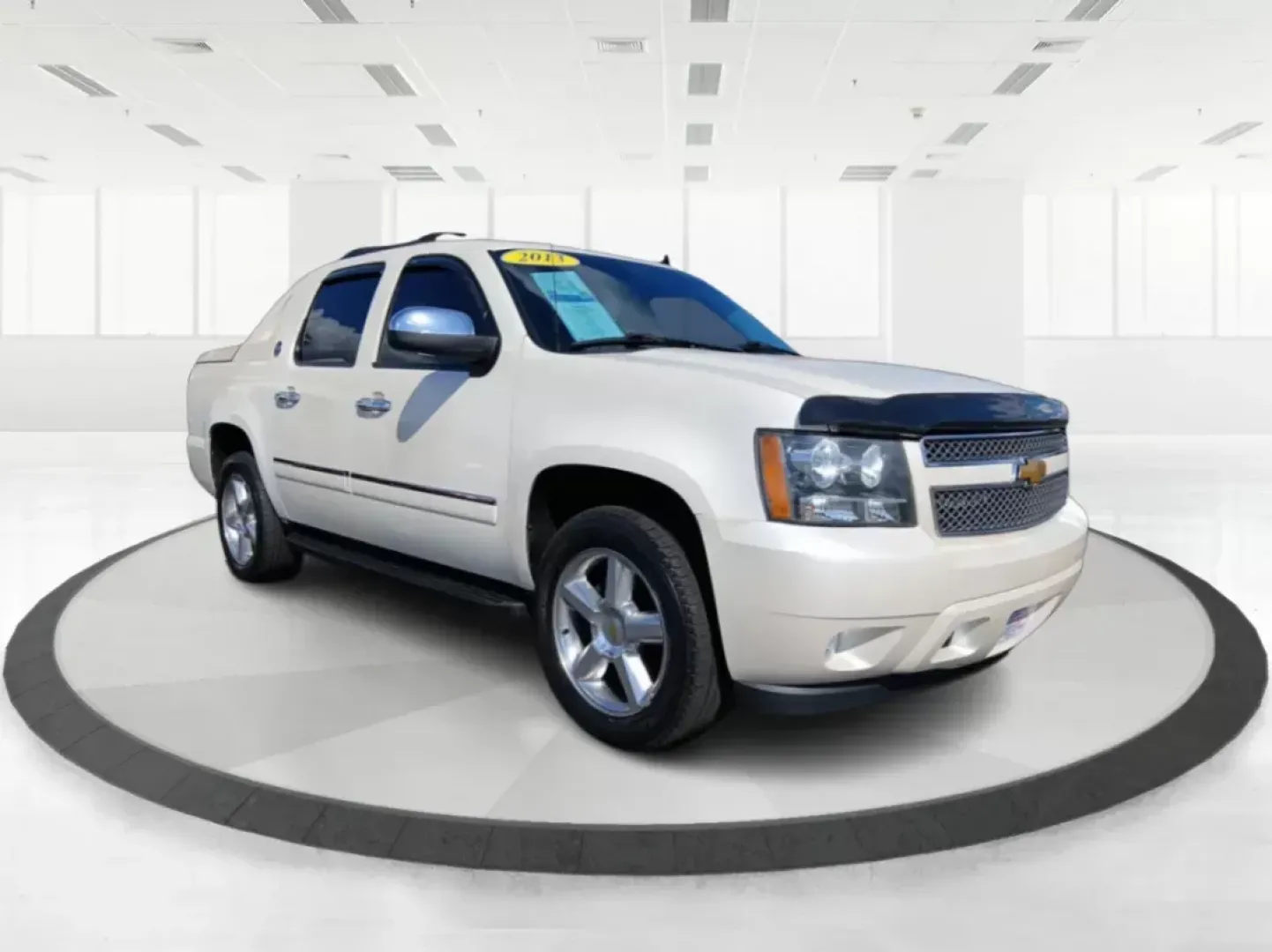 2013 Chevrolet Avalanche LTZ 4WD (3GNTKGE78DG) with an 5.3L V8 OHV 16V FFV engine, 4-Speed Automatic transmission, located at 8750 N County Rd 25A, Piqua, OH, 45356, (937) 908-9800, 40.164391, -84.232513 - 2013 Chevrolet Avalanche LTZ 4WD - Photo#0