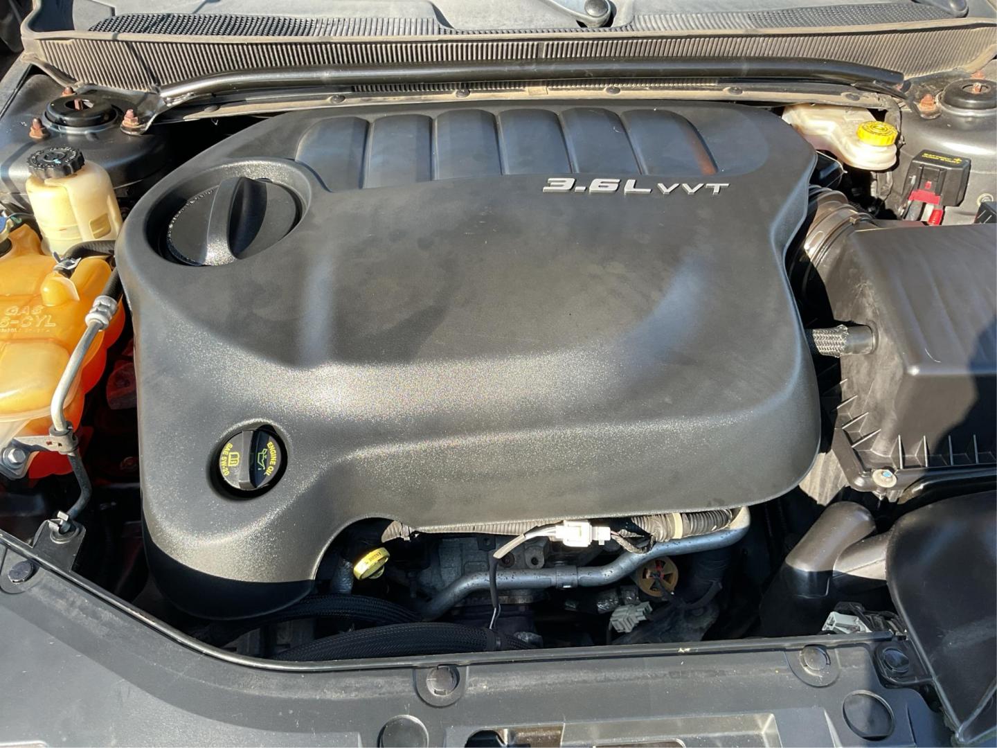2013 Chrysler 200 Touring (1C3CCBBG0DN) with an 2.4L I-4 DOHC engine, located at 401 Woodman Dr, Riverside, OH, 45431, (937) 908-9800, 39.760899, -84.123421 - 2013 Chrysler 200 Touring - Photo#10