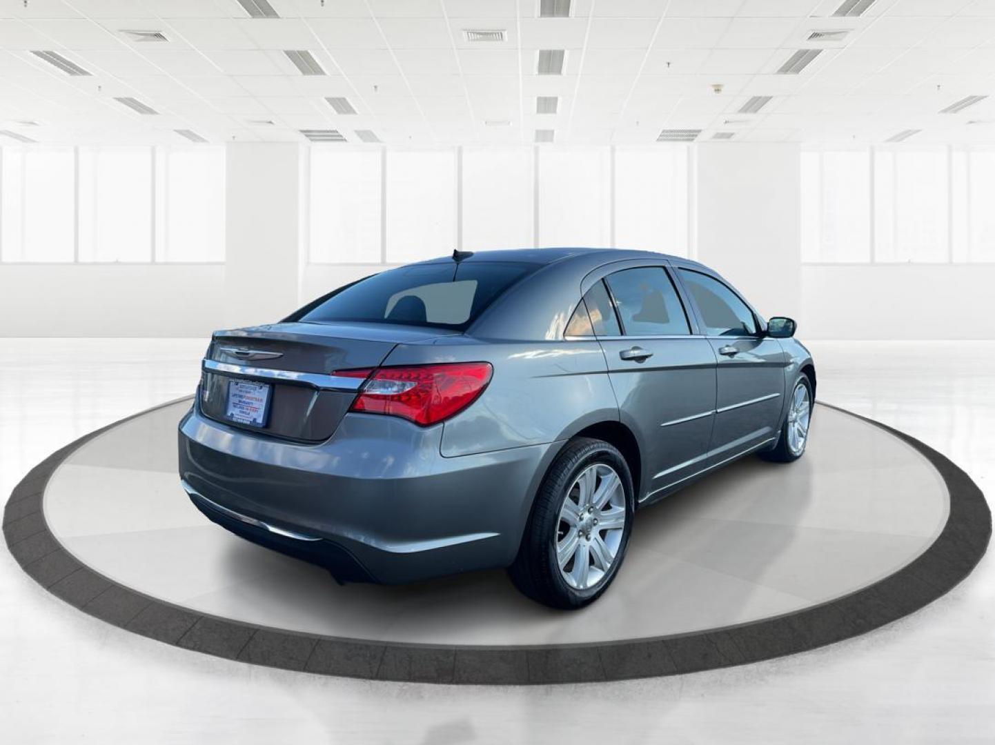 2013 Chrysler 200 Touring (1C3CCBBG0DN) with an 2.4L I-4 DOHC engine, located at 401 Woodman Dr, Riverside, OH, 45431, (937) 908-9800, 39.760899, -84.123421 - 2013 Chrysler 200 Touring - Photo#2
