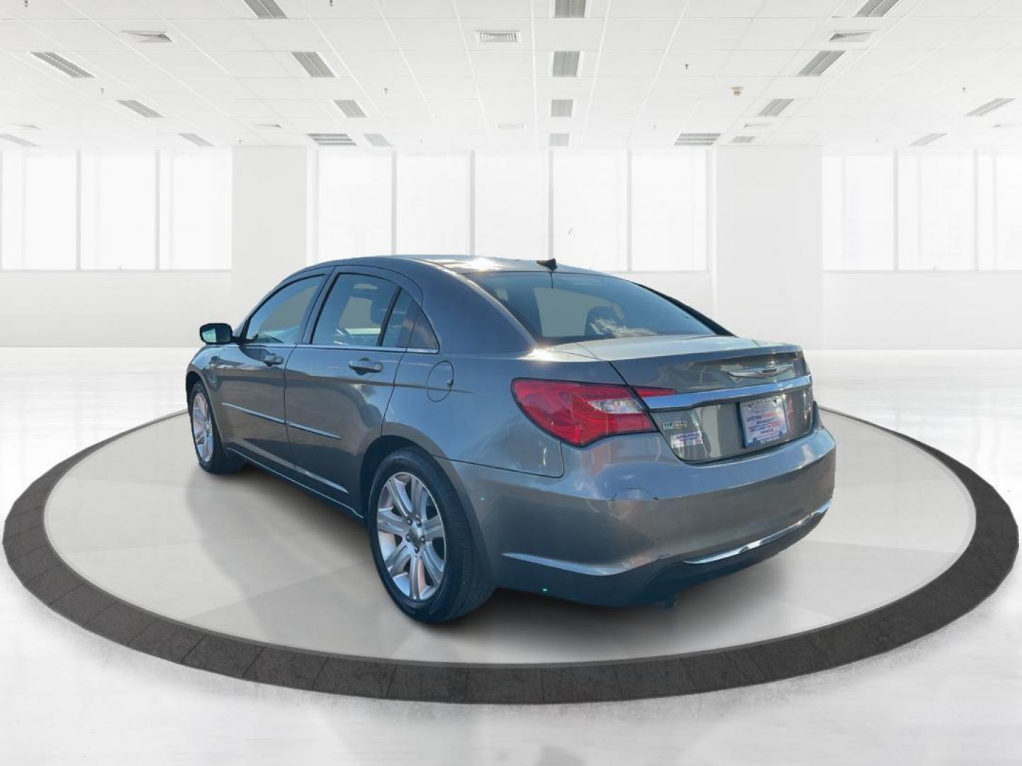 2013 Chrysler 200 Touring (1C3CCBBG0DN) with an 2.4L I-4 DOHC engine, located at 401 Woodman Dr, Riverside, OH, 45431, (937) 908-9800, 39.760899, -84.123421 - 2013 Chrysler 200 Touring - Photo#4