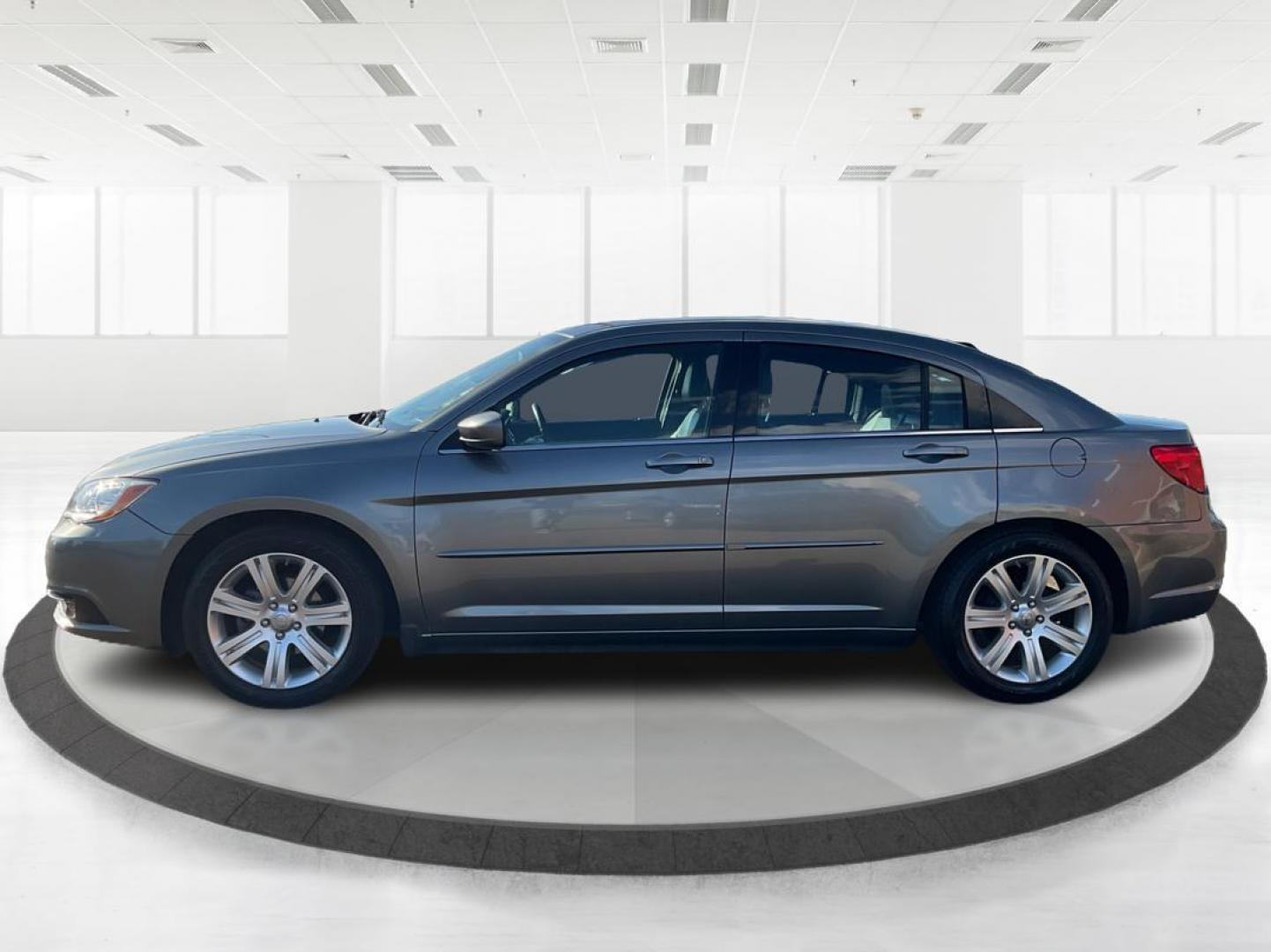 2013 Chrysler 200 Touring (1C3CCBBG0DN) with an 2.4L I-4 DOHC engine, located at 401 Woodman Dr, Riverside, OH, 45431, (937) 908-9800, 39.760899, -84.123421 - 2013 Chrysler 200 Touring - Photo#5