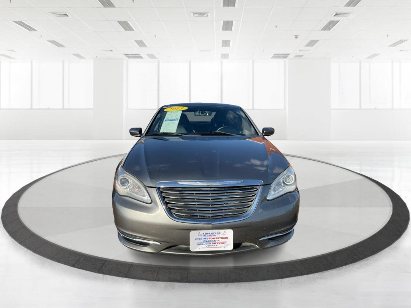 2013 Chrysler 200 Touring (1C3CCBBG0DN) with an 2.4L I-4 DOHC engine, located at 401 Woodman Dr, Riverside, OH, 45431, (937) 908-9800, 39.760899, -84.123421 - 2013 Chrysler 200 Touring - Photo#6