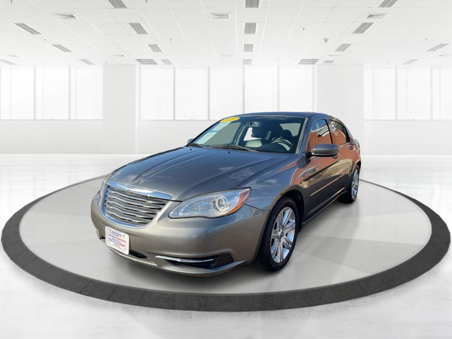 2013 Chrysler 200 Touring (1C3CCBBG0DN) with an 2.4L I-4 DOHC engine, located at 401 Woodman Dr, Riverside, OH, 45431, (937) 908-9800, 39.760899, -84.123421 - 2013 Chrysler 200 Touring - Photo#7