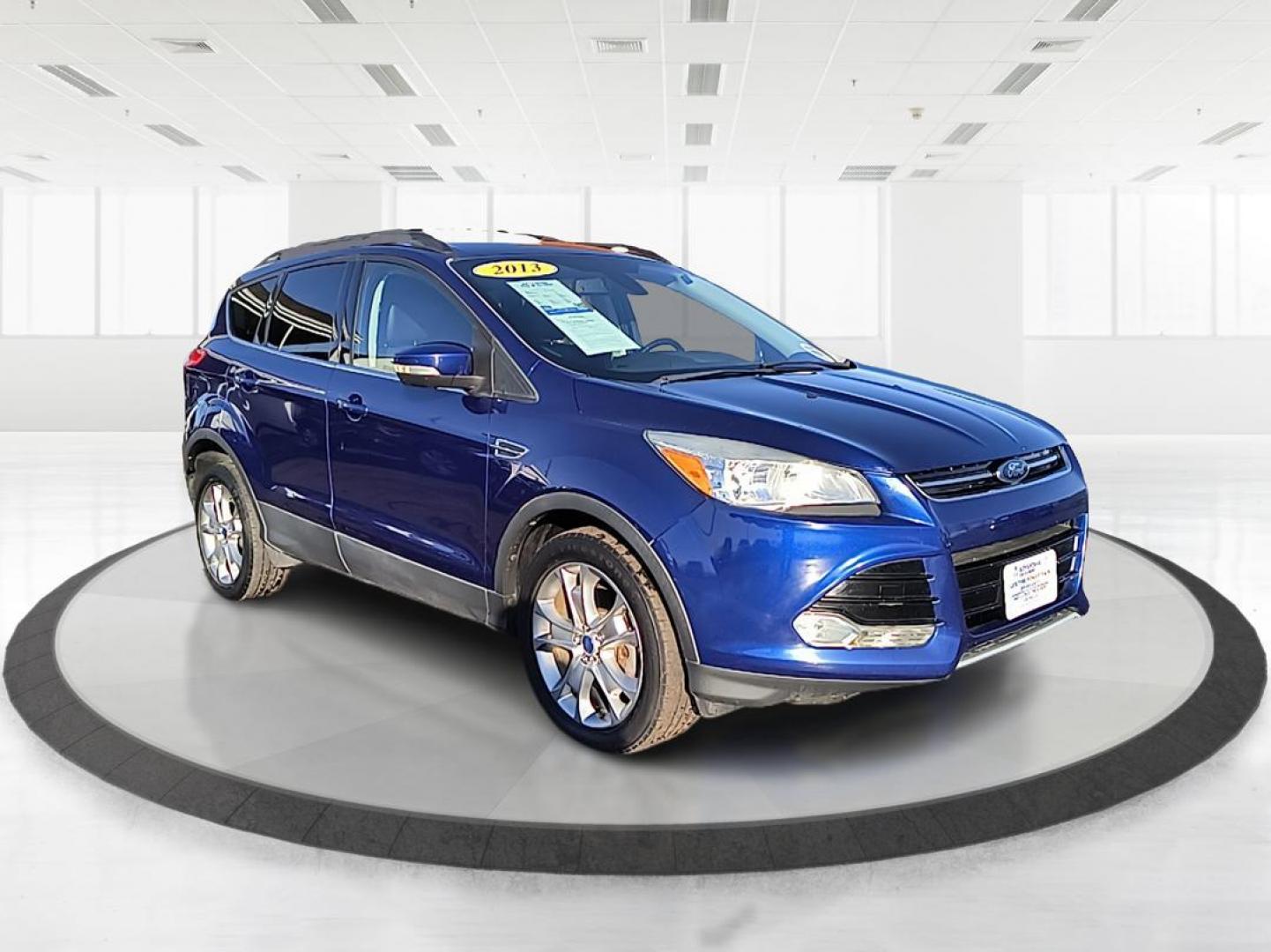 2013 Ford Escape SEL FWD (1FMCU0H99DU) with an 2.0L L4 DOHC 16V engine, 6-Speed Automatic transmission, located at 1099 N County Rd 25A , Troy, OH, 45373, (937) 908-9800, 40.057079, -84.212883 - 2013 Ford Escape SEL FWD - Photo#0