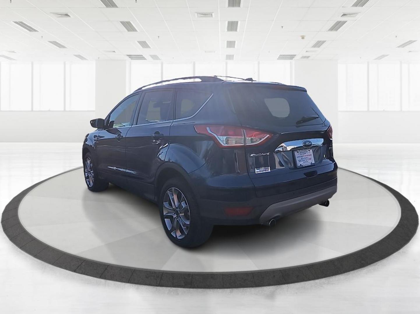 2013 Ford Escape SEL FWD (1FMCU0H99DU) with an 2.0L L4 DOHC 16V engine, 6-Speed Automatic transmission, located at 1099 N County Rd 25A , Troy, OH, 45373, (937) 908-9800, 40.057079, -84.212883 - 2013 Ford Escape SEL FWD - Photo#4