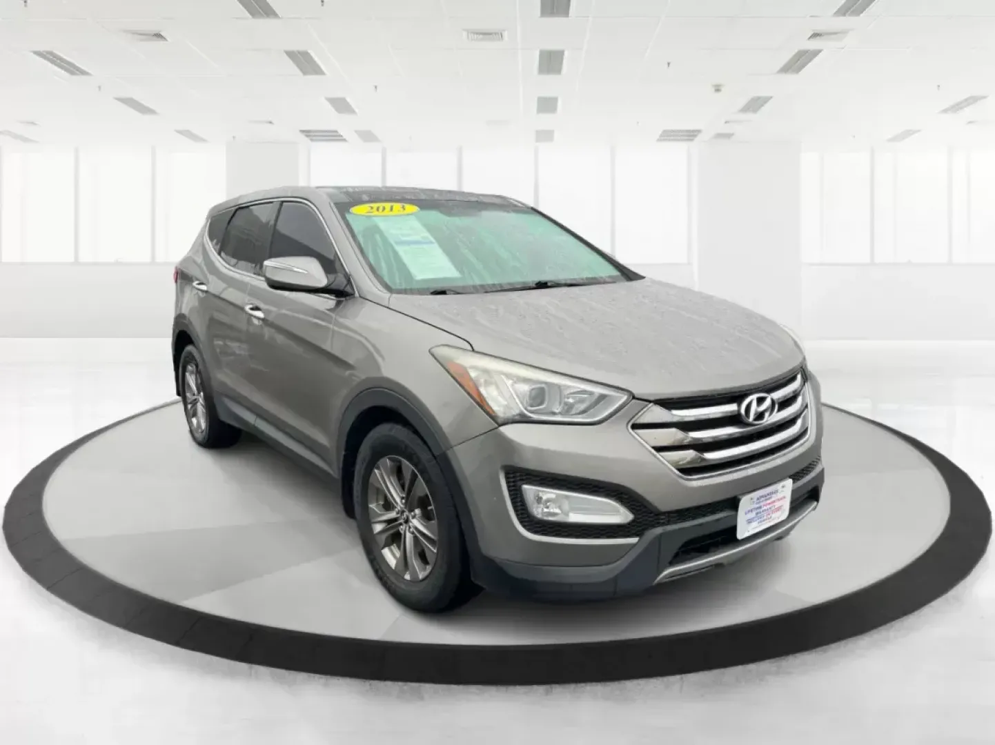 2013 Mineral Gray Hyundai Santa Fe Sport 2.4 AWD (5XYZUDLBXDG) with an 2.4L L4 DOHC 16V engine, 6-Speed Automatic transmission, located at 1184 Kauffman Ave, Fairborn, OH, 45324, (937) 908-9800, 39.807072, -84.030914 - 2013 Hyundai Santa Fe Sport 2.4 AWD - Photo#0