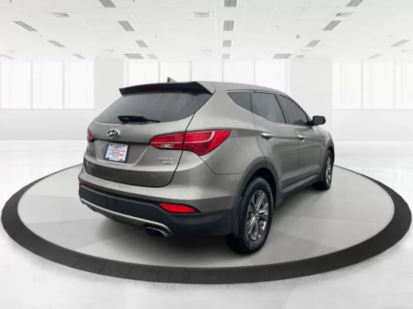 2013 Mineral Gray Hyundai Santa Fe Sport 2.4 AWD (5XYZUDLBXDG) with an 2.4L L4 DOHC 16V engine, 6-Speed Automatic transmission, located at 1184 Kauffman Ave, Fairborn, OH, 45324, (937) 908-9800, 39.807072, -84.030914 - 2013 Hyundai Santa Fe Sport 2.4 AWD - Photo#2
