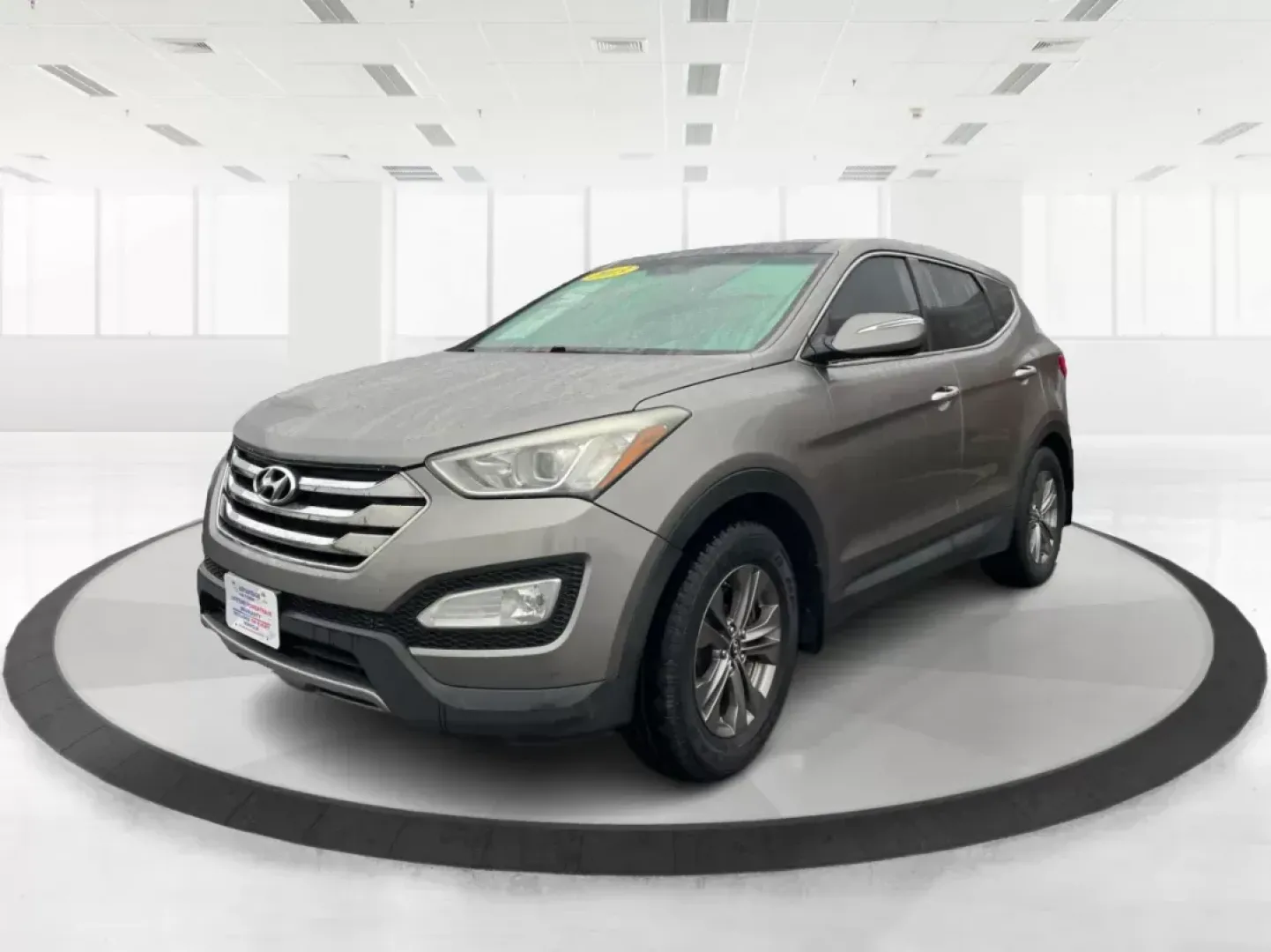 2013 Mineral Gray Hyundai Santa Fe Sport 2.4 AWD (5XYZUDLBXDG) with an 2.4L L4 DOHC 16V engine, 6-Speed Automatic transmission, located at 1184 Kauffman Ave, Fairborn, OH, 45324, (937) 908-9800, 39.807072, -84.030914 - 2013 Hyundai Santa Fe Sport 2.4 AWD - Photo#7