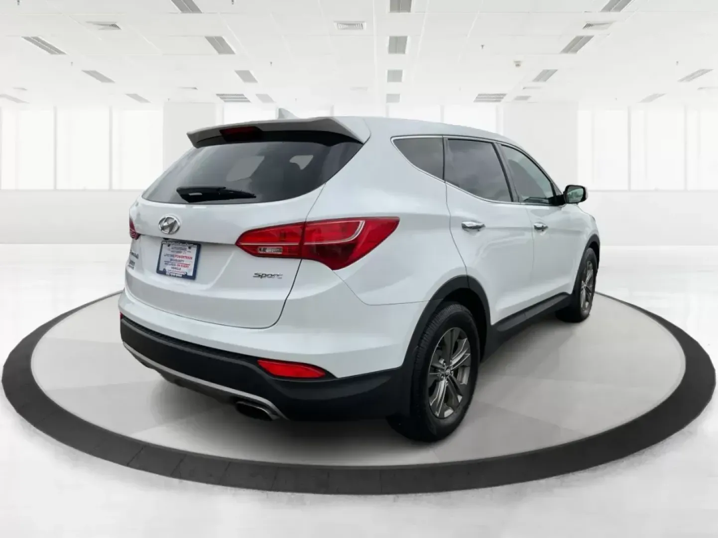 2013 Hyundai Santa Fe Sport (5XYZU3LB9DG) with an Theta II 2.4L I-4 gasoline direct injection engine, located at 4508 South Dixie Dr, Moraine, OH, 45439, (937) 908-9800, 39.689976, -84.218452 - One Owner - Photo#2