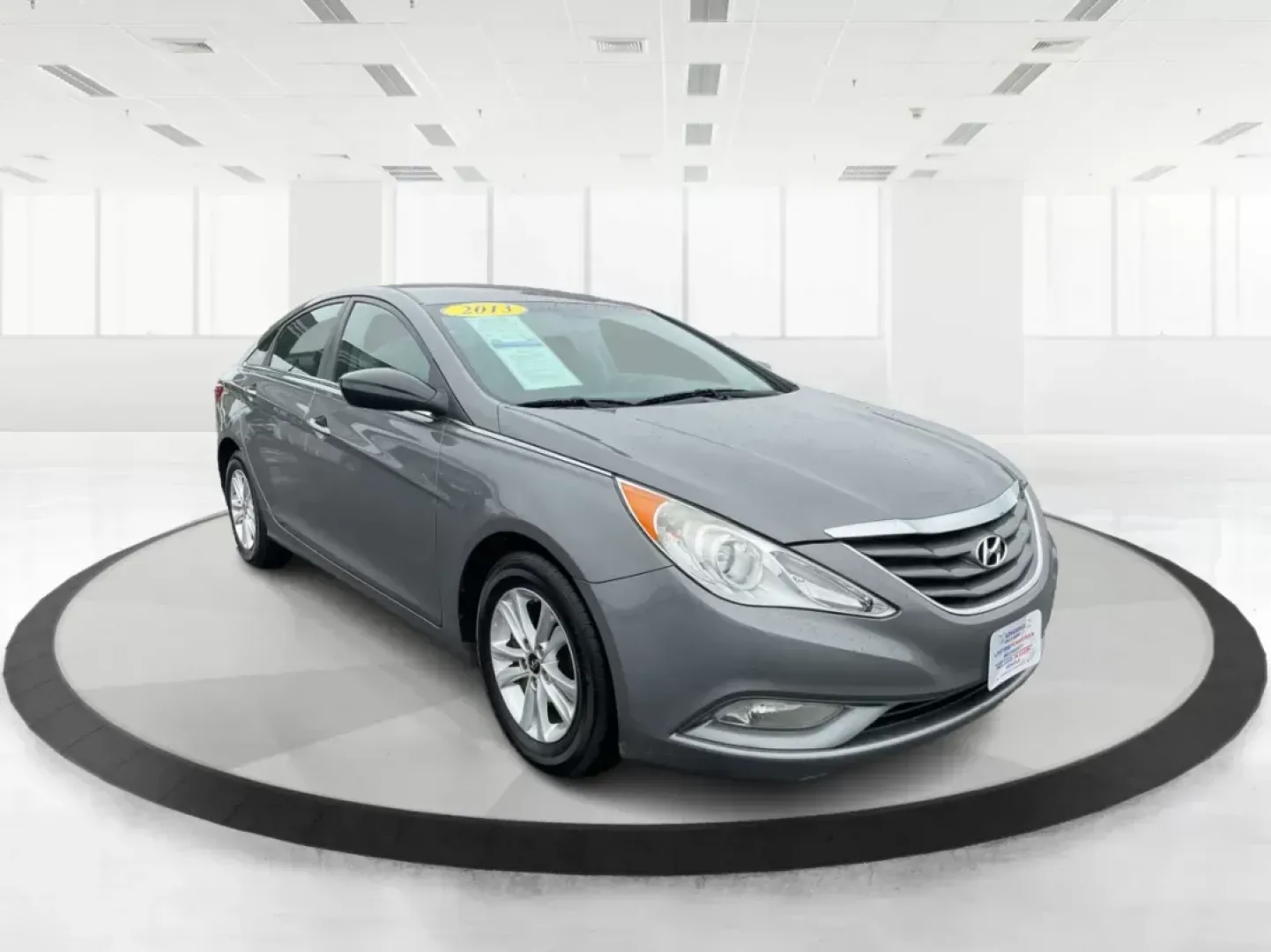 2013 Gray Hyundai Sonata GLS (5NPEB4AC5DH) with an 2.4L L4 DOHC 16V engine, 6-Speed Automatic transmission, located at 8750 N County Rd 25A, Piqua, OH, 45356, (937) 908-9800, 40.164391, -84.232513 - **Embrace the Open Road with the 2013 Hyundai Sonata A Perfect Companion for Life's Journeys!**<br /> <br /> Are you in the market for an affordable, reliable vehicle that can seamlessly adapt to your lifestyle? Look no further than the 2013 Hyundai Sonata, priced competitively at just $13,995! Thi - Photo#0