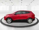 2013 Hyundai Tucson Limited (KM8JU3AC4DU) with an Theta II 2.4L I-4 DOHC engine, located at 1099 N County Rd 25A , Troy, OH, 45373, (937) 908-9800, 40.057079, -84.212883 - 2013 Hyundai Tucson Limited - Photo#5