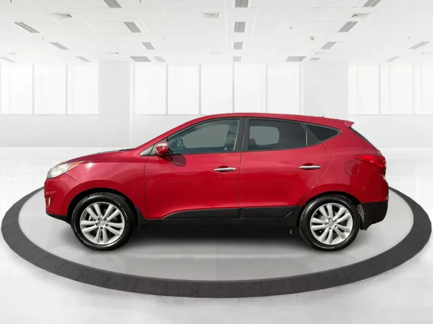 2013 Hyundai Tucson Limited (KM8JU3AC4DU) with an Theta II 2.4L I-4 DOHC engine, located at 1099 N County Rd 25A , Troy, OH, 45373, (937) 908-9800, 40.057079, -84.212883 - 2013 Hyundai Tucson Limited - Photo#5