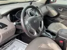 2013 Hyundai Tucson Limited (KM8JU3AC4DU) with an Theta II 2.4L I-4 DOHC engine, located at 1099 N County Rd 25A , Troy, OH, 45373, (937) 908-9800, 40.057079, -84.212883 - 2013 Hyundai Tucson Limited - Photo#8