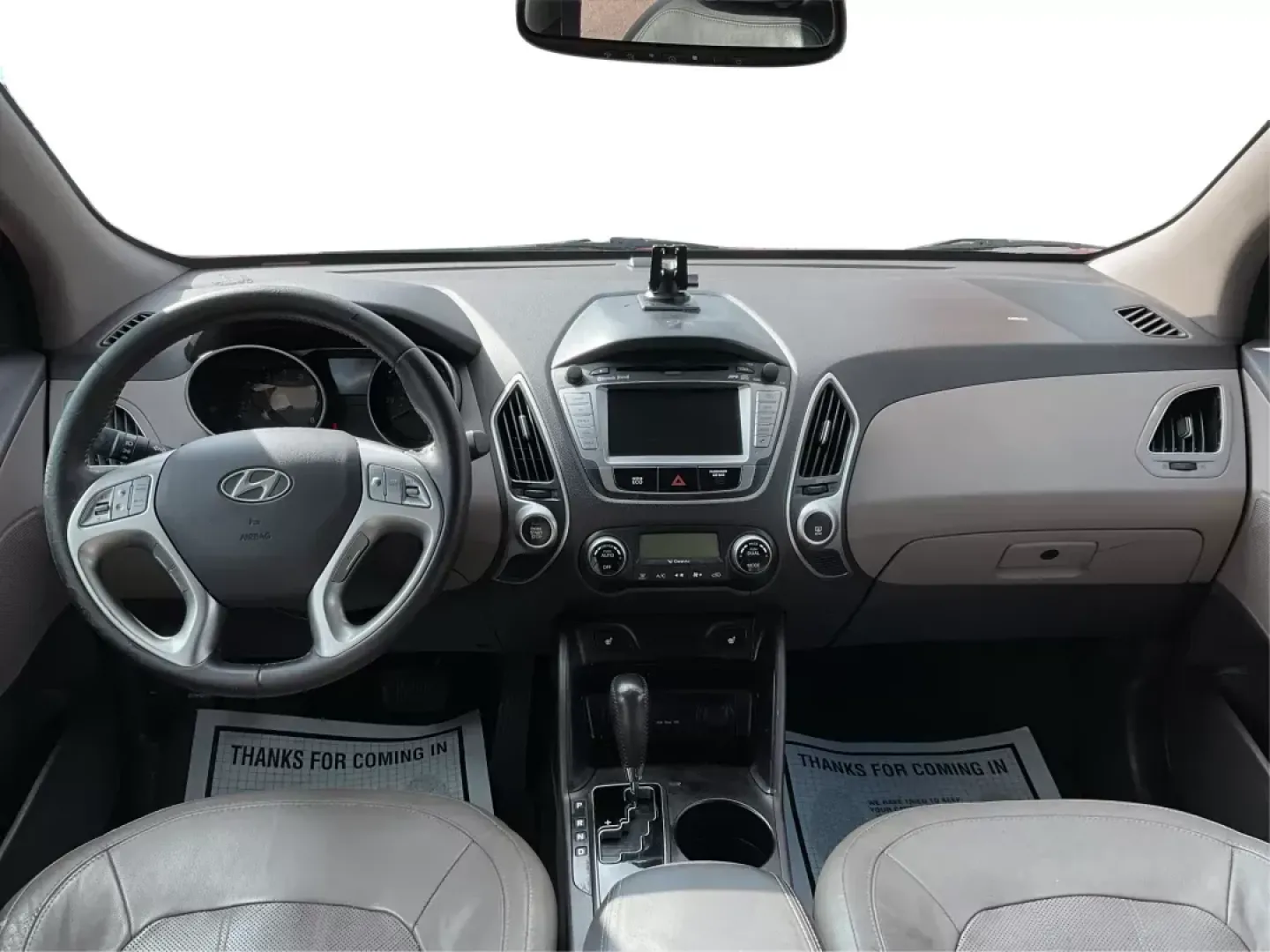 2013 Hyundai Tucson Limited (KM8JU3AC4DU) with an Theta II 2.4L I-4 DOHC engine, located at 1099 N County Rd 25A , Troy, OH, 45373, (937) 908-9800, 40.057079, -84.212883 - 2013 Hyundai Tucson Limited - Photo#19