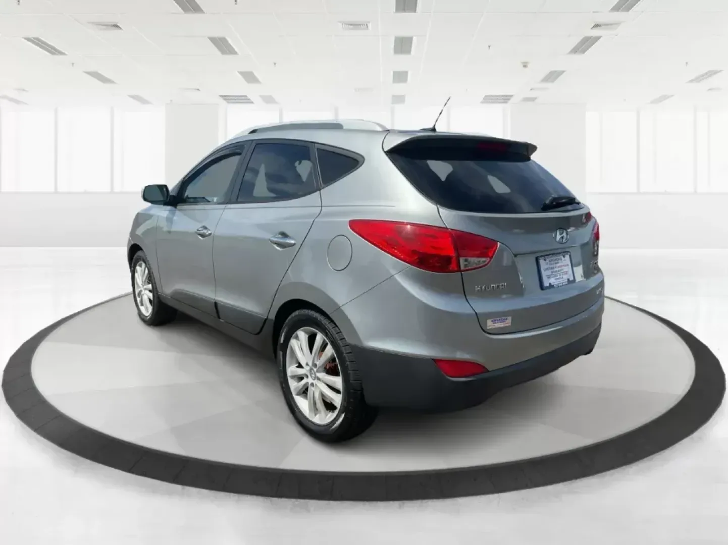 2013 Hyundai Tucson Limited (KM8JUCAC4DU) with an Other engine, located at 1184 Kauffman Ave, Fairborn, OH, 45324, (937) 908-9800, 39.807072, -84.030914 - 2013 Hyundai Tucson Limited - Photo#4