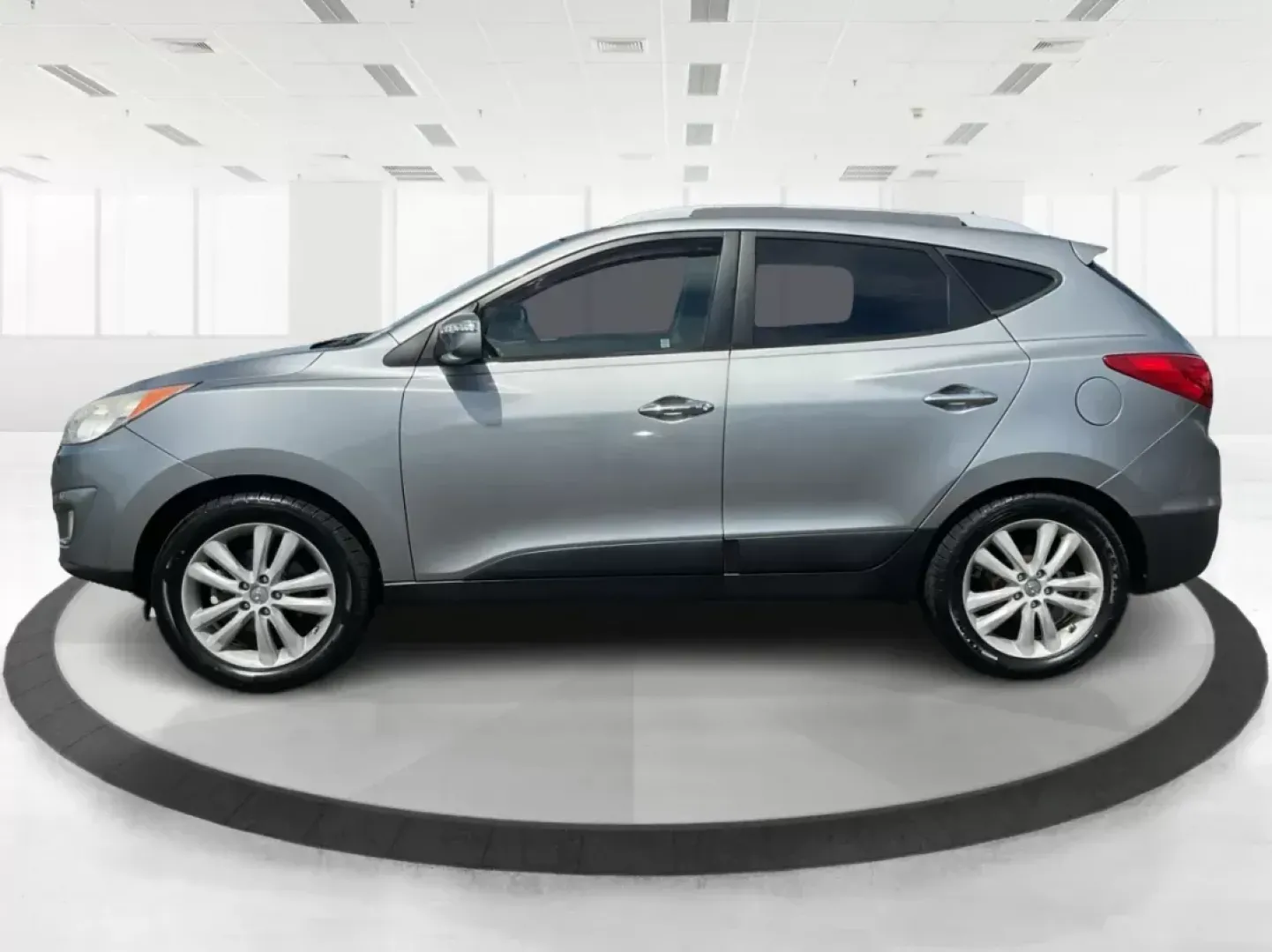 2013 Hyundai Tucson Limited (KM8JUCAC4DU) with an Other engine, located at 1184 Kauffman Ave, Fairborn, OH, 45324, (937) 908-9800, 39.807072, -84.030914 - 2013 Hyundai Tucson Limited - Photo#5