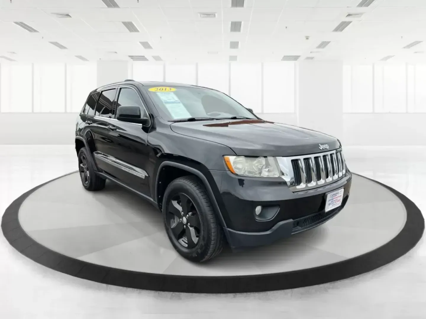 2013 Jeep Grand Cherokee Laredo (1C4RJFAGXDC) with an Other engine, located at 8750 N County Rd 25A, Piqua, OH, 45356, (937) 908-9800, 40.164391, -84.232513 - 2013 Jeep Grand Cherokee Laredo - Photo#0