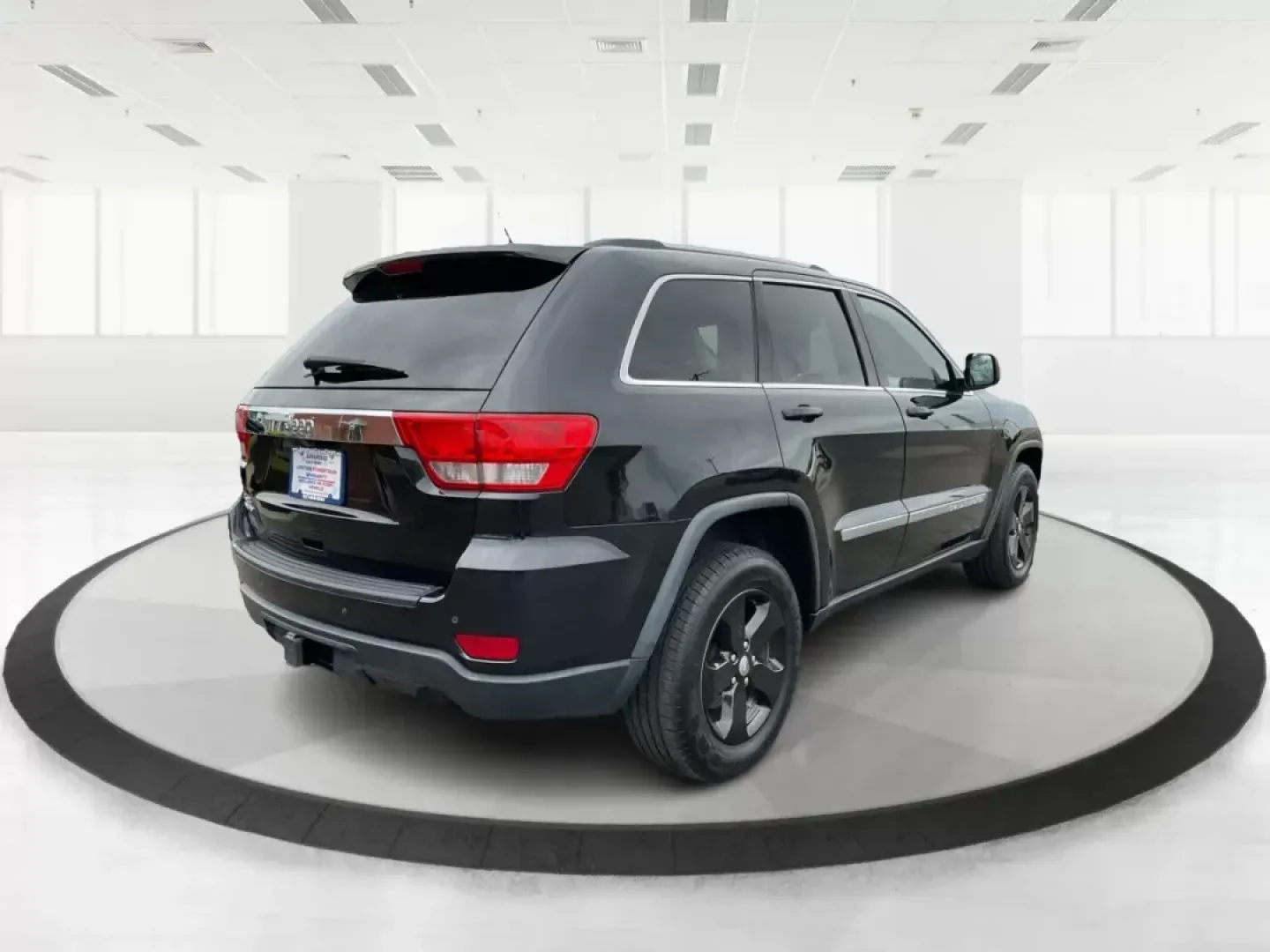 2013 Jeep Grand Cherokee Laredo (1C4RJFAGXDC) with an Other engine, located at 8750 N County Rd 25A, Piqua, OH, 45356, (937) 908-9800, 40.164391, -84.232513 - 2013 Jeep Grand Cherokee Laredo - Photo#2