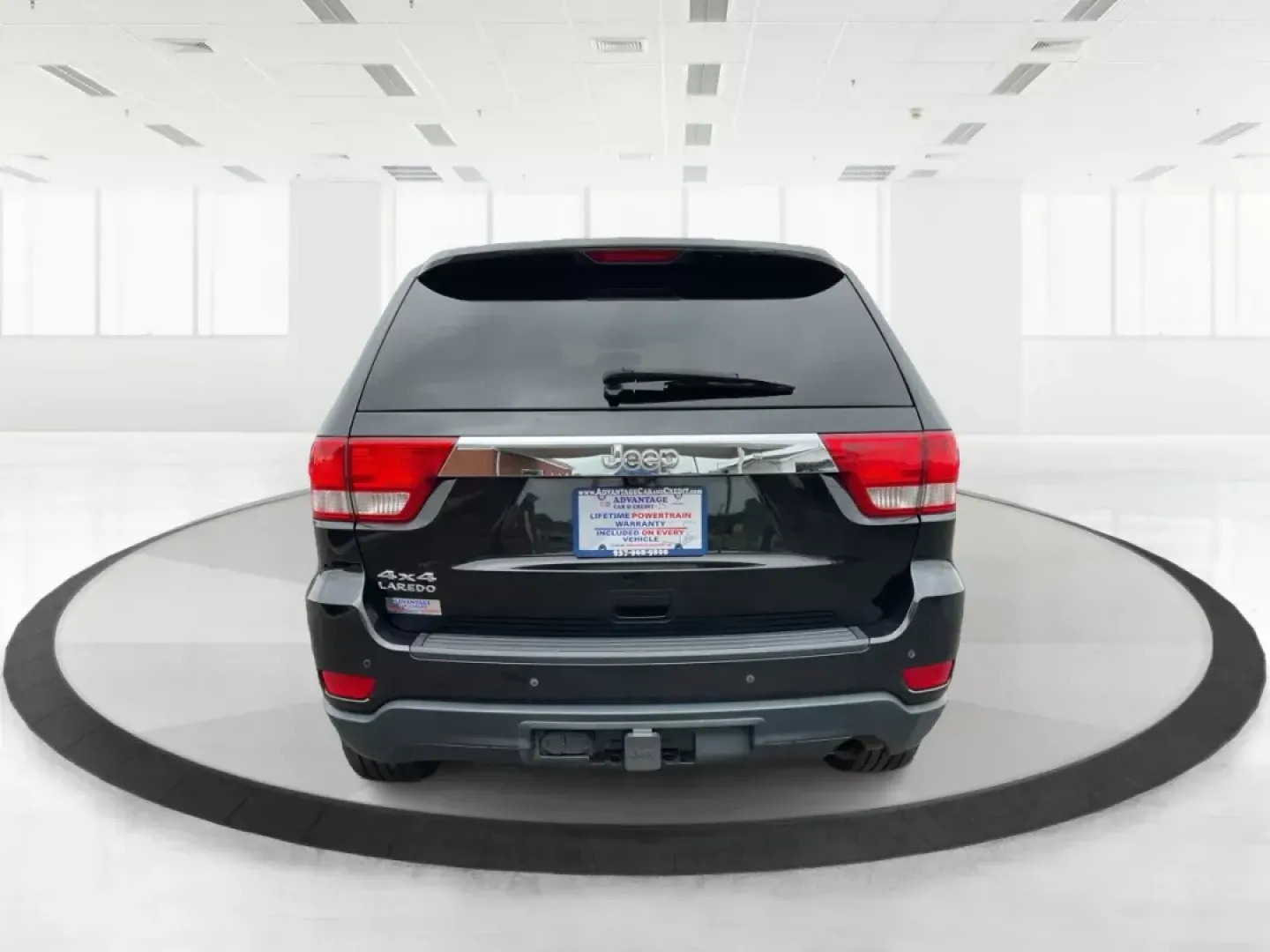 2013 Jeep Grand Cherokee Laredo (1C4RJFAGXDC) with an Other engine, located at 8750 N County Rd 25A, Piqua, OH, 45356, (937) 908-9800, 40.164391, -84.232513 - 2013 Jeep Grand Cherokee Laredo - Photo#4