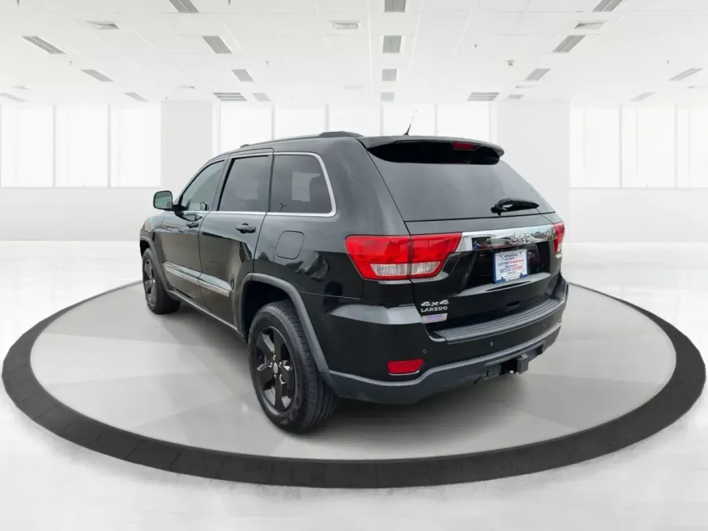 2013 Jeep Grand Cherokee Laredo (1C4RJFAGXDC) with an Other engine, located at 8750 N County Rd 25A, Piqua, OH, 45356, (937) 908-9800, 40.164391, -84.232513 - 2013 Jeep Grand Cherokee Laredo - Photo#5