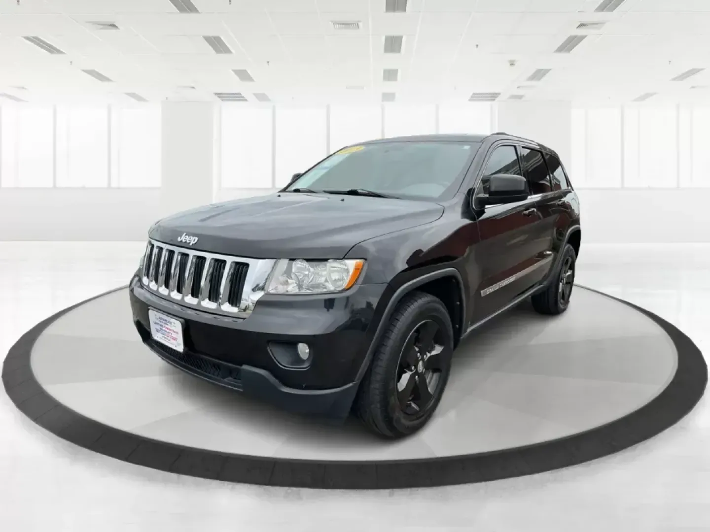 2013 Jeep Grand Cherokee Laredo (1C4RJFAGXDC) with an Other engine, located at 8750 N County Rd 25A, Piqua, OH, 45356, (937) 908-9800, 40.164391, -84.232513 - 2013 Jeep Grand Cherokee Laredo - Photo#8