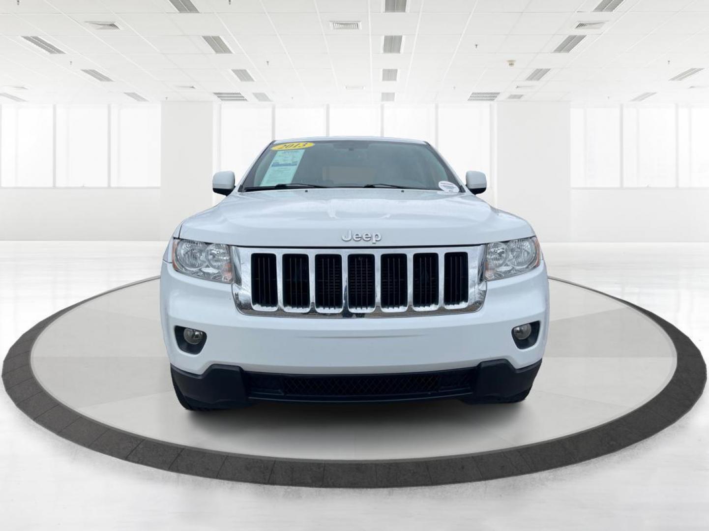 2013 Jeep Grand Cherokee Laredo (1C4RJFAG8DC) with an 3.6L V-6 DOHC engine, located at 880 E. National Road, Vandalia, OH, 45377, (937) 908-9800, 39.891918, -84.183594 - 2013 Jeep Grand Cherokee Laredo - Photo#6