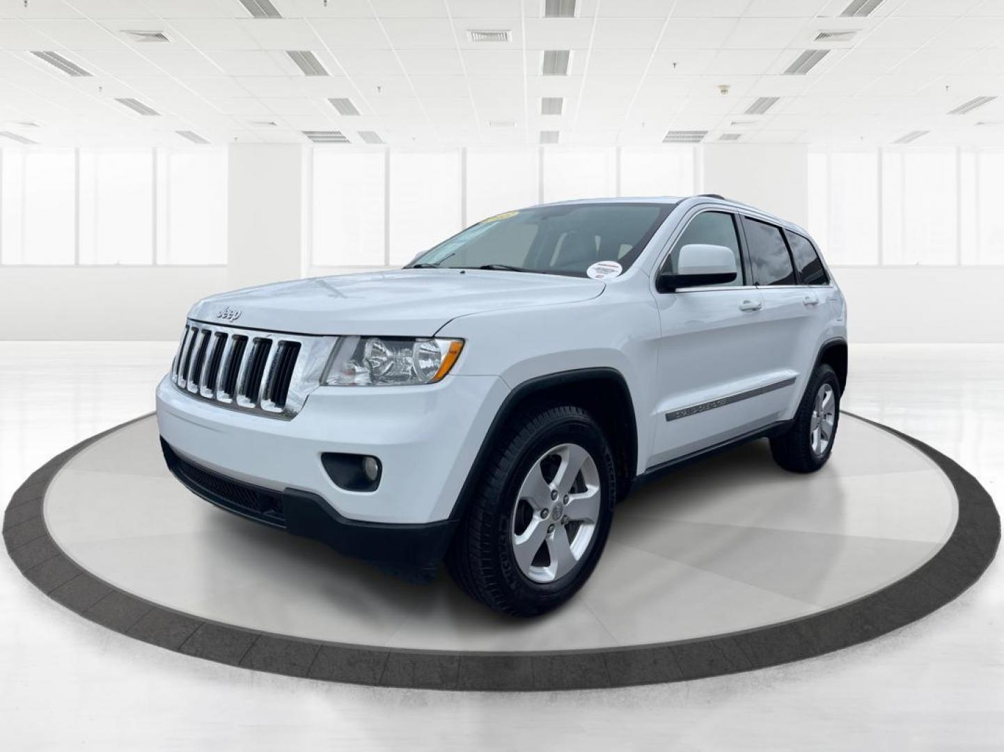 2013 Jeep Grand Cherokee Laredo (1C4RJFAG8DC) with an 3.6L V-6 DOHC engine, located at 880 E. National Road, Vandalia, OH, 45377, (937) 908-9800, 39.891918, -84.183594 - 2013 Jeep Grand Cherokee Laredo - Photo#7