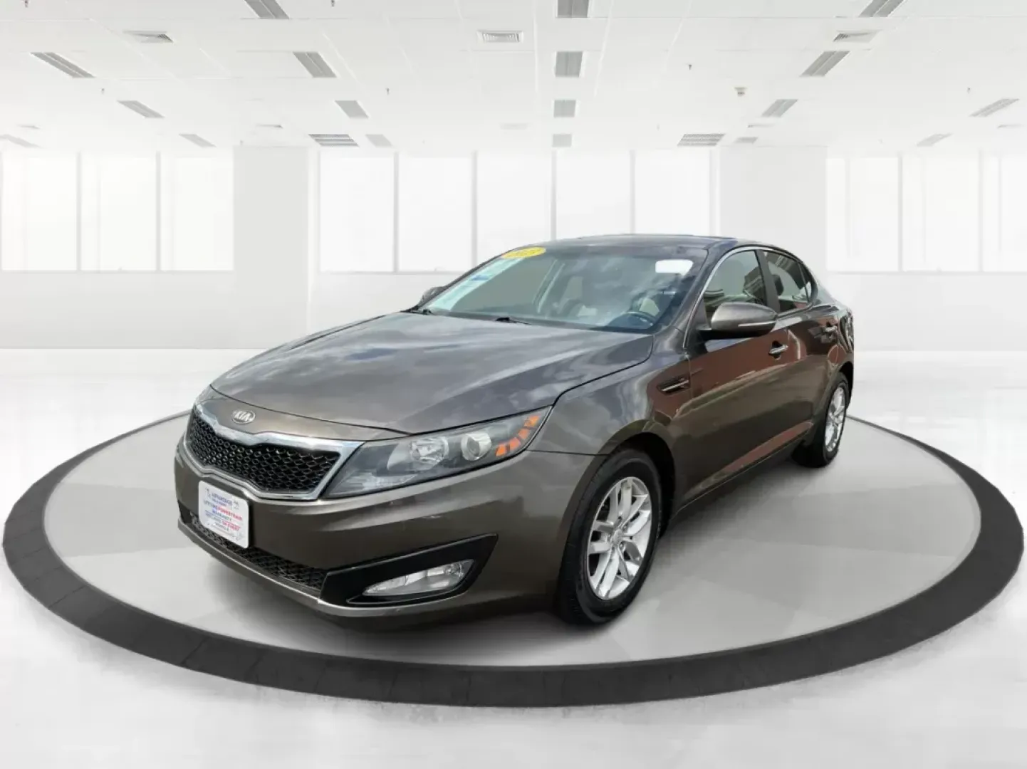 2013 Kia Optima LX (5XXGM4A71DG) with an 2.4L I-4 gasoline direct injection engine, located at 880 E. National Road, Vandalia, OH, 45377, (937) 908-9800, 39.891918, -84.183594 - 2013 Kia Optima LX - Photo#7