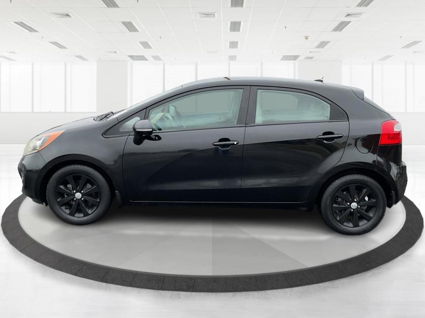 2013 Kia Rio EX (KNADN5A30D6) with an 1.6L I-4 gasoline direct injection engine, located at 880 E. National Road, Vandalia, OH, 45377, (937) 908-9800, 39.891918, -84.183594 - 2013 Kia Rio EX - Photo#5