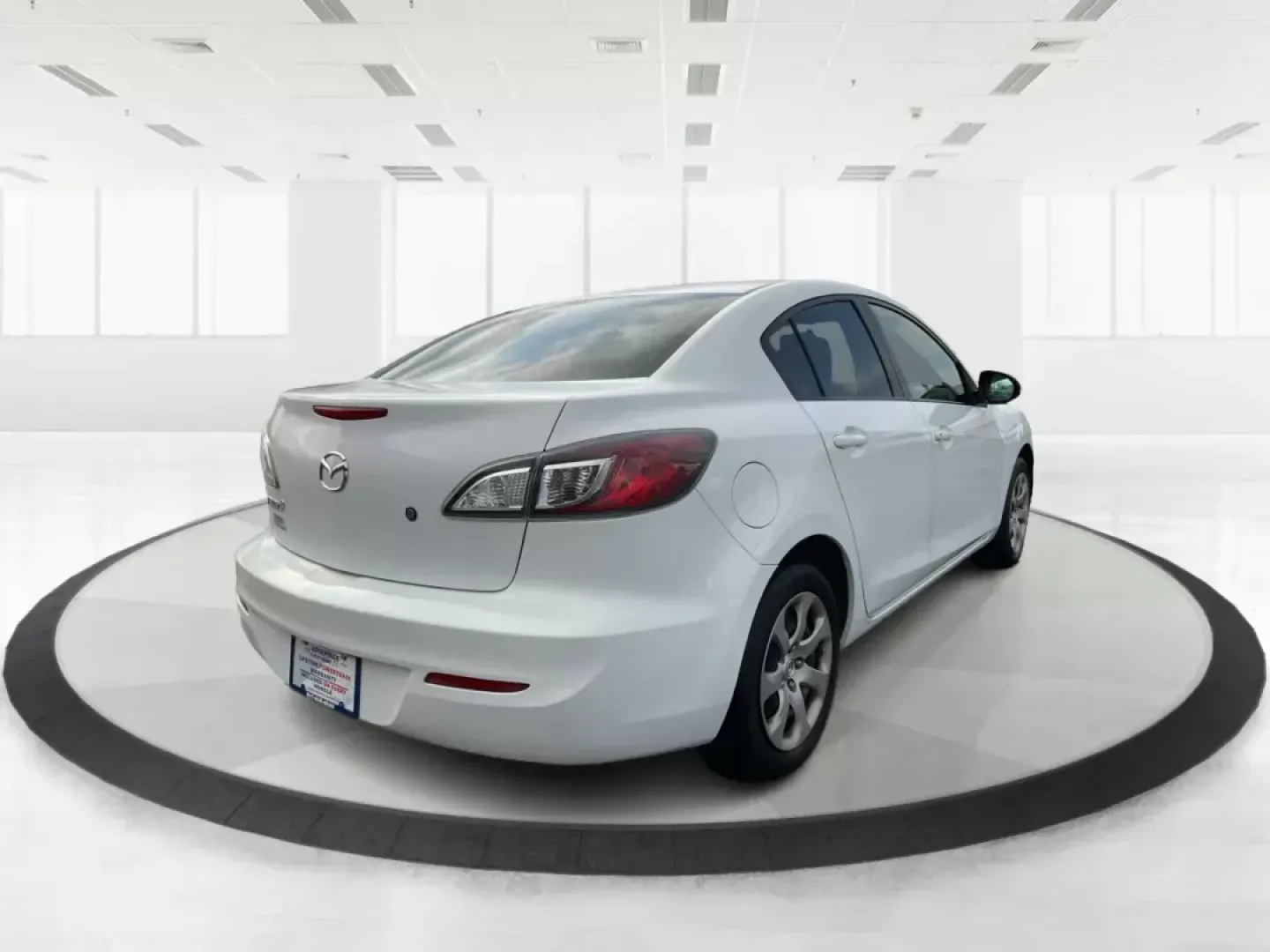 2013 Mazda Mazda3 i SV (JM1BL1TF0D1) with an 2L I-4 DOHC engine, located at 1184 Kauffman Ave, Fairborn, OH, 45324, (937) 908-9800, 39.807072, -84.030914 - 2013 Mazda Mazda3 i SV - Photo#2