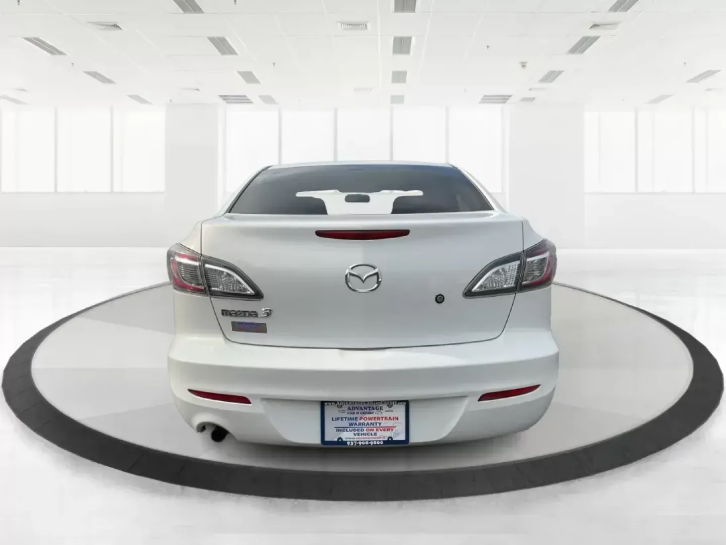 2013 Mazda Mazda3 i SV (JM1BL1TF0D1) with an 2L I-4 DOHC engine, located at 1184 Kauffman Ave, Fairborn, OH, 45324, (937) 908-9800, 39.807072, -84.030914 - 2013 Mazda Mazda3 i SV - Photo#4