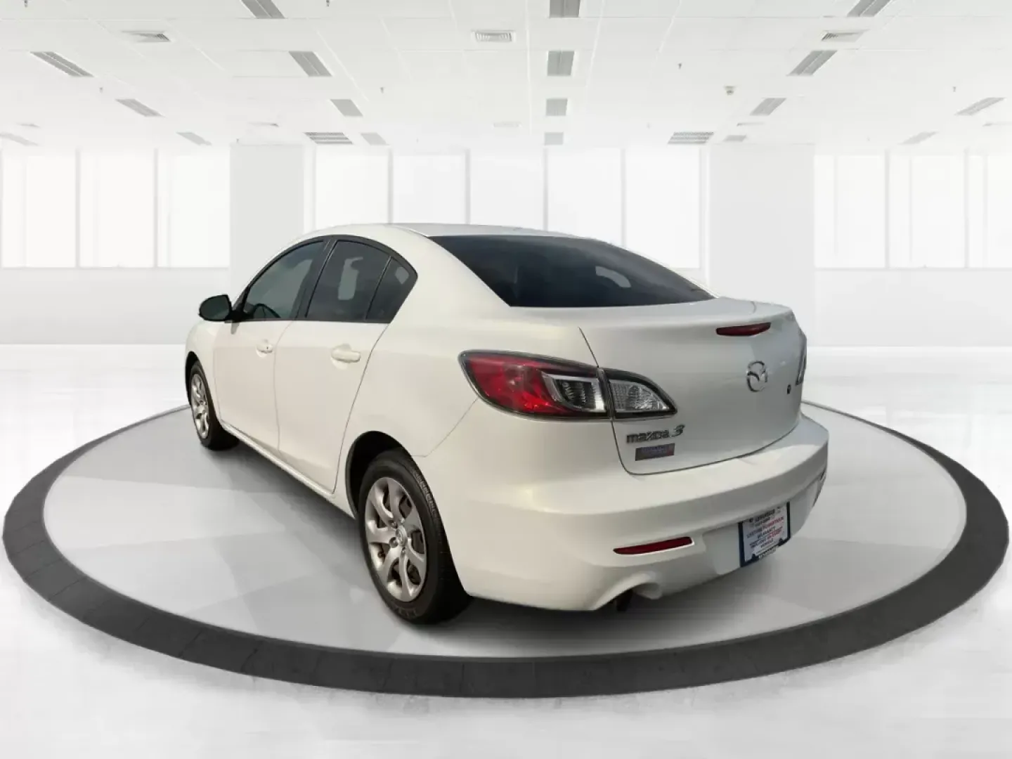 2013 Mazda Mazda3 i SV (JM1BL1TF0D1) with an 2L I-4 DOHC engine, located at 1184 Kauffman Ave, Fairborn, OH, 45324, (937) 908-9800, 39.807072, -84.030914 - 2013 Mazda Mazda3 i SV - Photo#5
