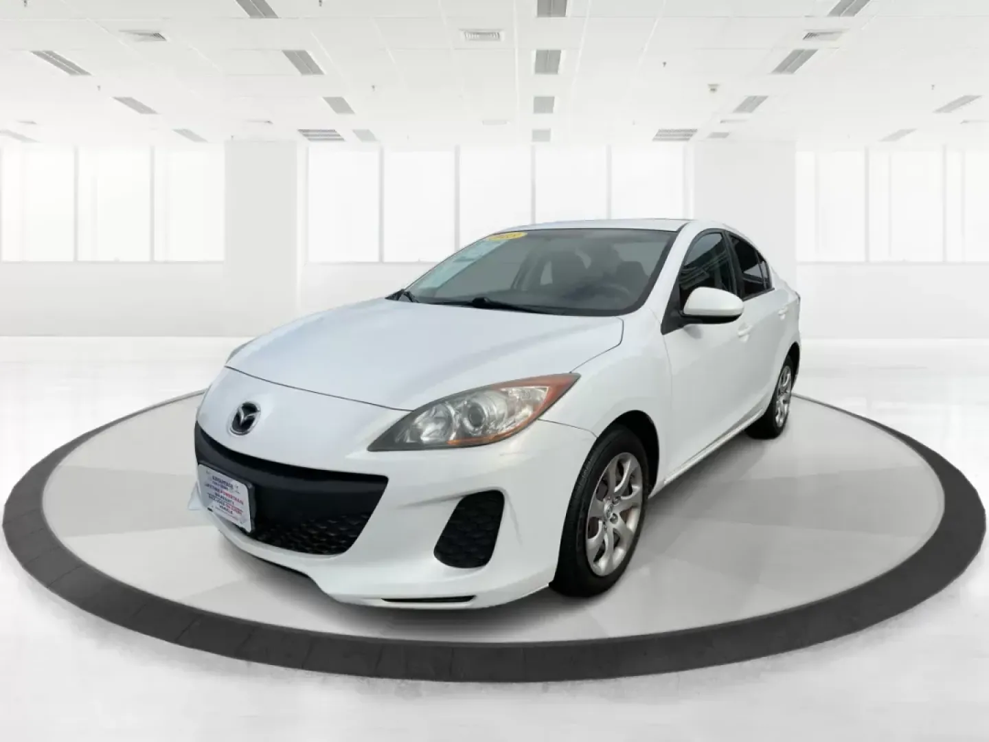 2013 Mazda Mazda3 i SV (JM1BL1TF0D1) with an 2L I-4 DOHC engine, located at 1184 Kauffman Ave, Fairborn, OH, 45324, (937) 908-9800, 39.807072, -84.030914 - 2013 Mazda Mazda3 i SV - Photo#8