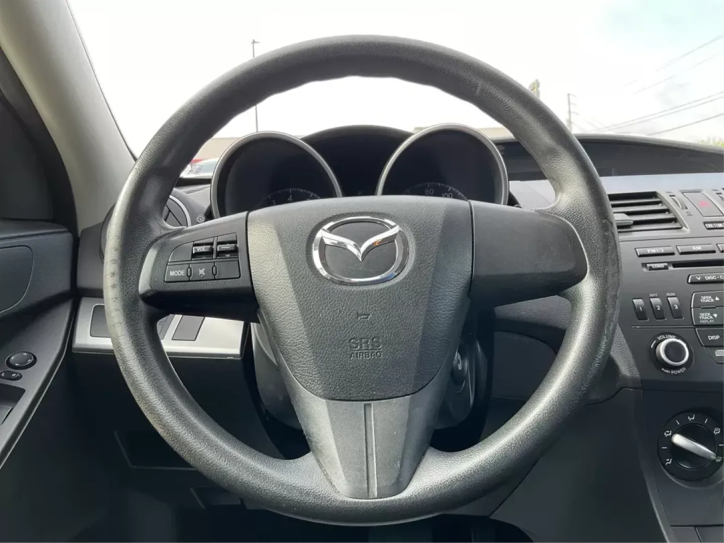 2013 Mazda Mazda3 i SV (JM1BL1TF0D1) with an 2L I-4 DOHC engine, located at 1184 Kauffman Ave, Fairborn, OH, 45324, (937) 908-9800, 39.807072, -84.030914 - 2013 Mazda Mazda3 i SV - Photo#16