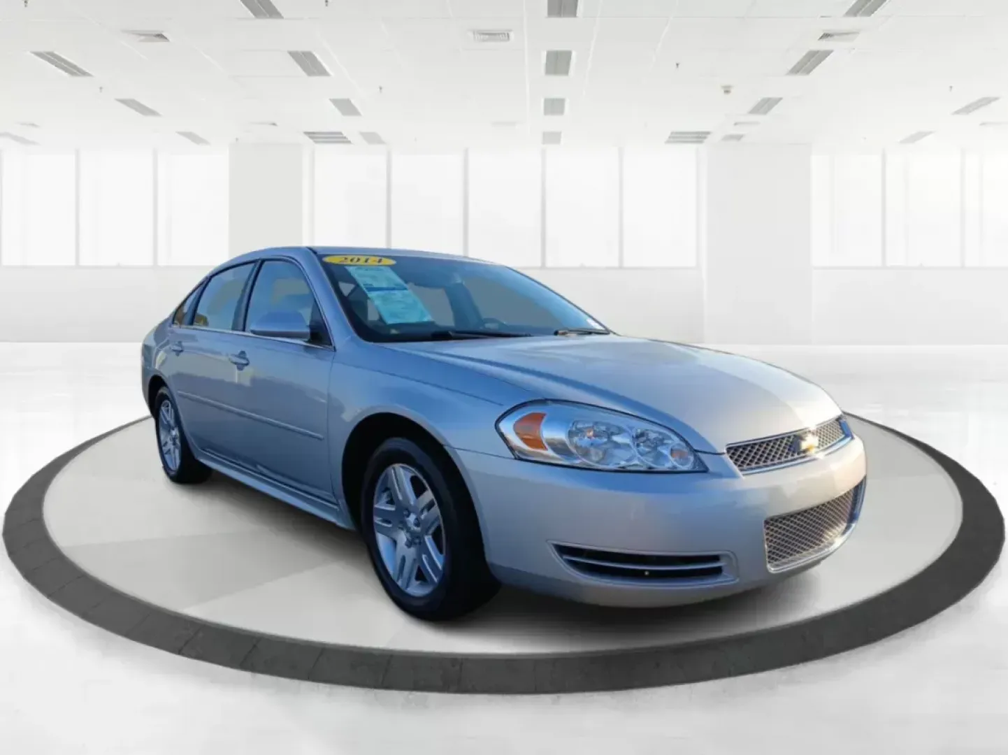 2014 Chevrolet Impala Limited LT (2G1WB5E3XE1) with an 3.6L V6 DOHC 16V FFV engine, 6-Speed Automatic transmission, located at 8750 N County Rd 25A, Piqua, OH, 45356, (937) 908-9800, 40.164391, -84.232513 - 2014 Chevrolet Impala Limited LT - Photo#0