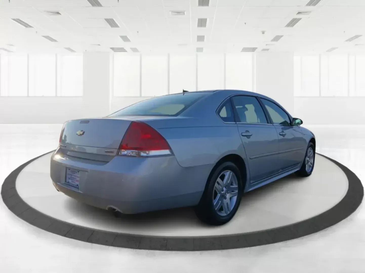 2014 Chevrolet Impala Limited LT (2G1WB5E3XE1) with an 3.6L V6 DOHC 16V FFV engine, 6-Speed Automatic transmission, located at 8750 N County Rd 25A, Piqua, OH, 45356, (937) 908-9800, 40.164391, -84.232513 - 2014 Chevrolet Impala Limited LT - Photo#2