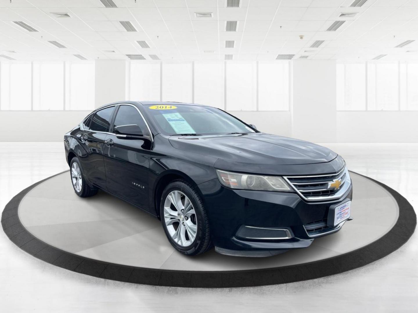 2014 Black Chevrolet Impala 2LT (2G1125S32E9) with an 3.6L V6 DOHC 24VV FFV engine, 6-Speed Automatic transmission, located at 1099 N County Rd 25A , Troy, OH, 45373, (937) 908-9800, 40.057079, -84.212883 - 2014 Chevrolet Impala 2LT - Photo#0