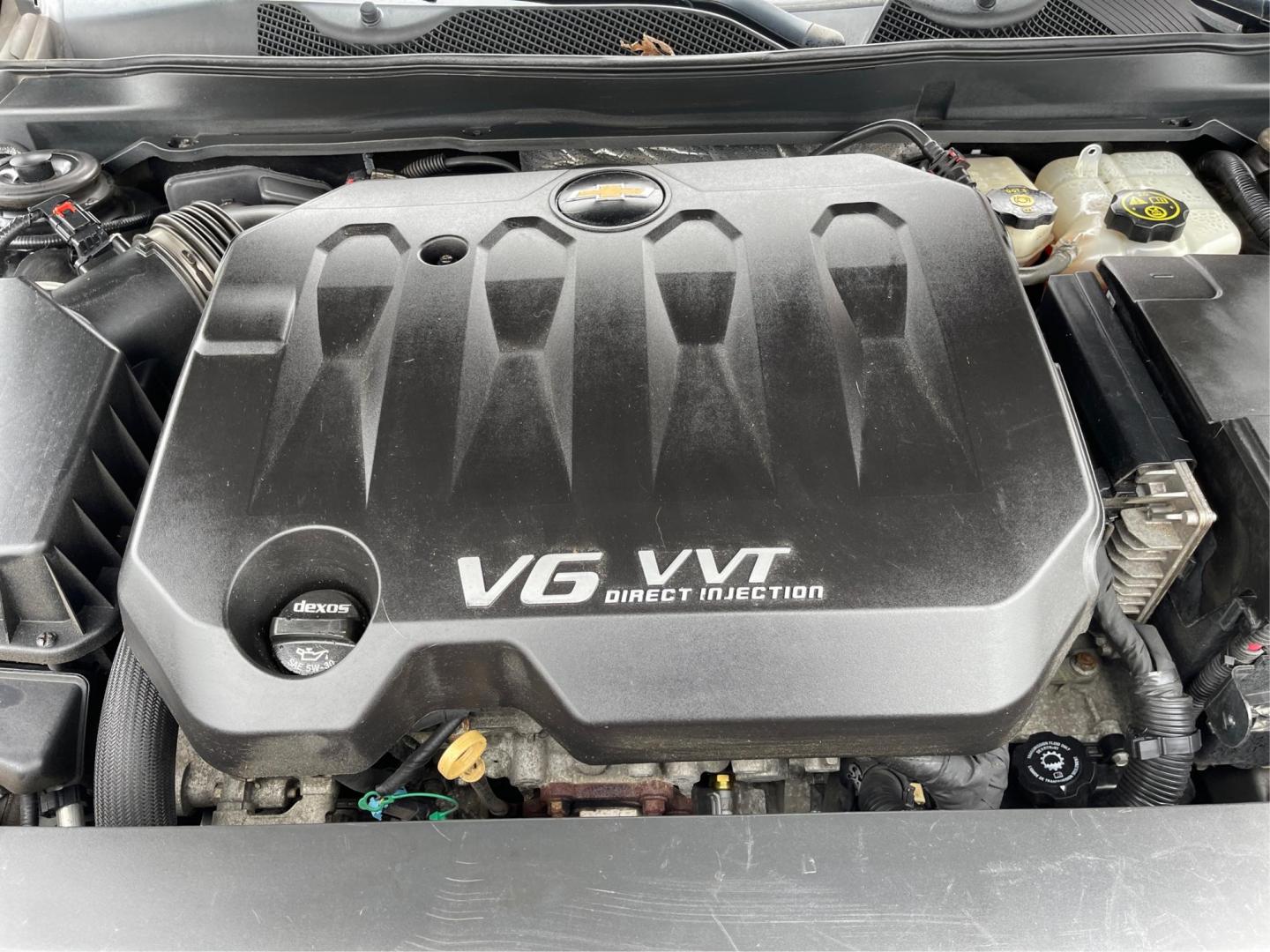 2014 Black Chevrolet Impala 2LT (2G1125S32E9) with an 3.6L V6 DOHC 24VV FFV engine, 6-Speed Automatic transmission, located at 1099 N County Rd 25A , Troy, OH, 45373, (937) 908-9800, 40.057079, -84.212883 - 2014 Chevrolet Impala 2LT - Photo#10